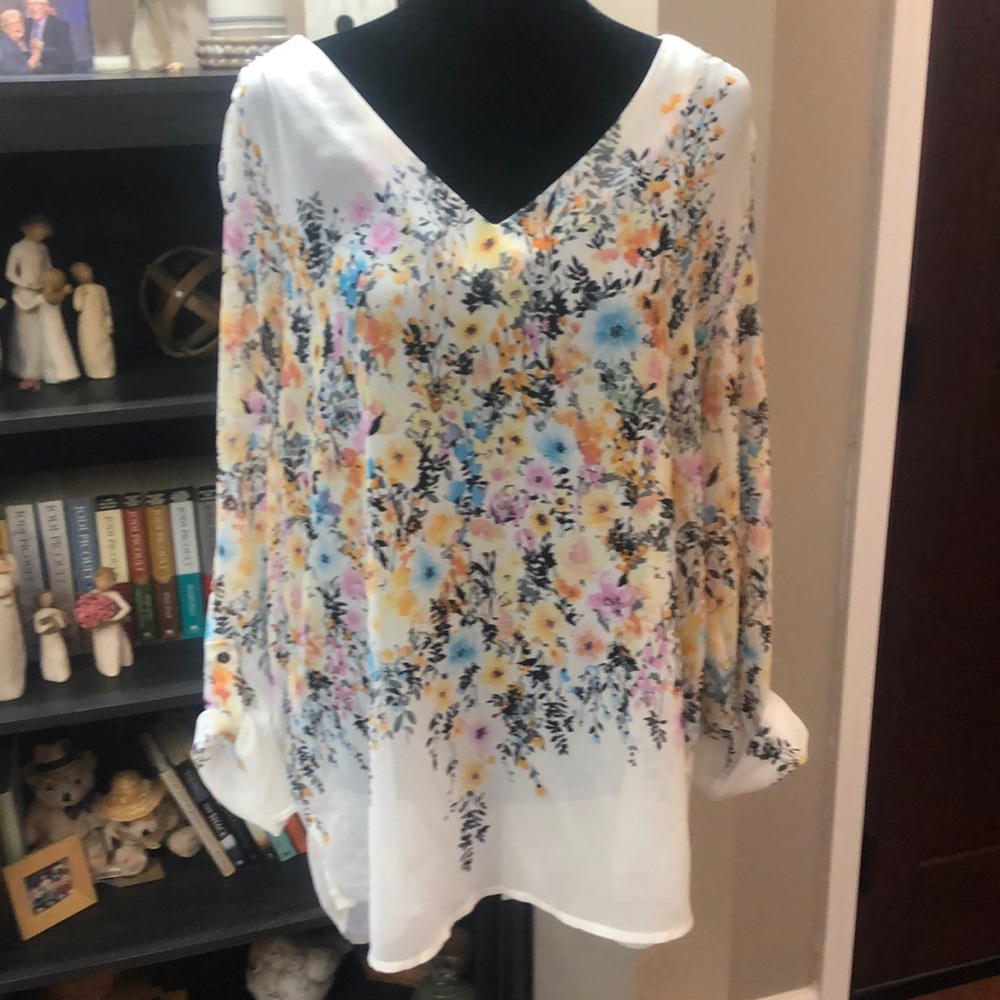 White floral blouse, size large.